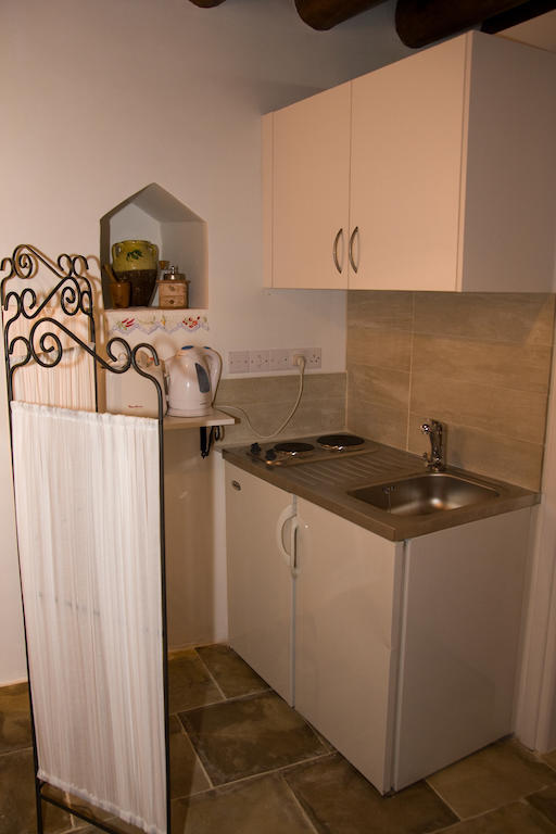 Xenios Cottages Lofou Habitación foto